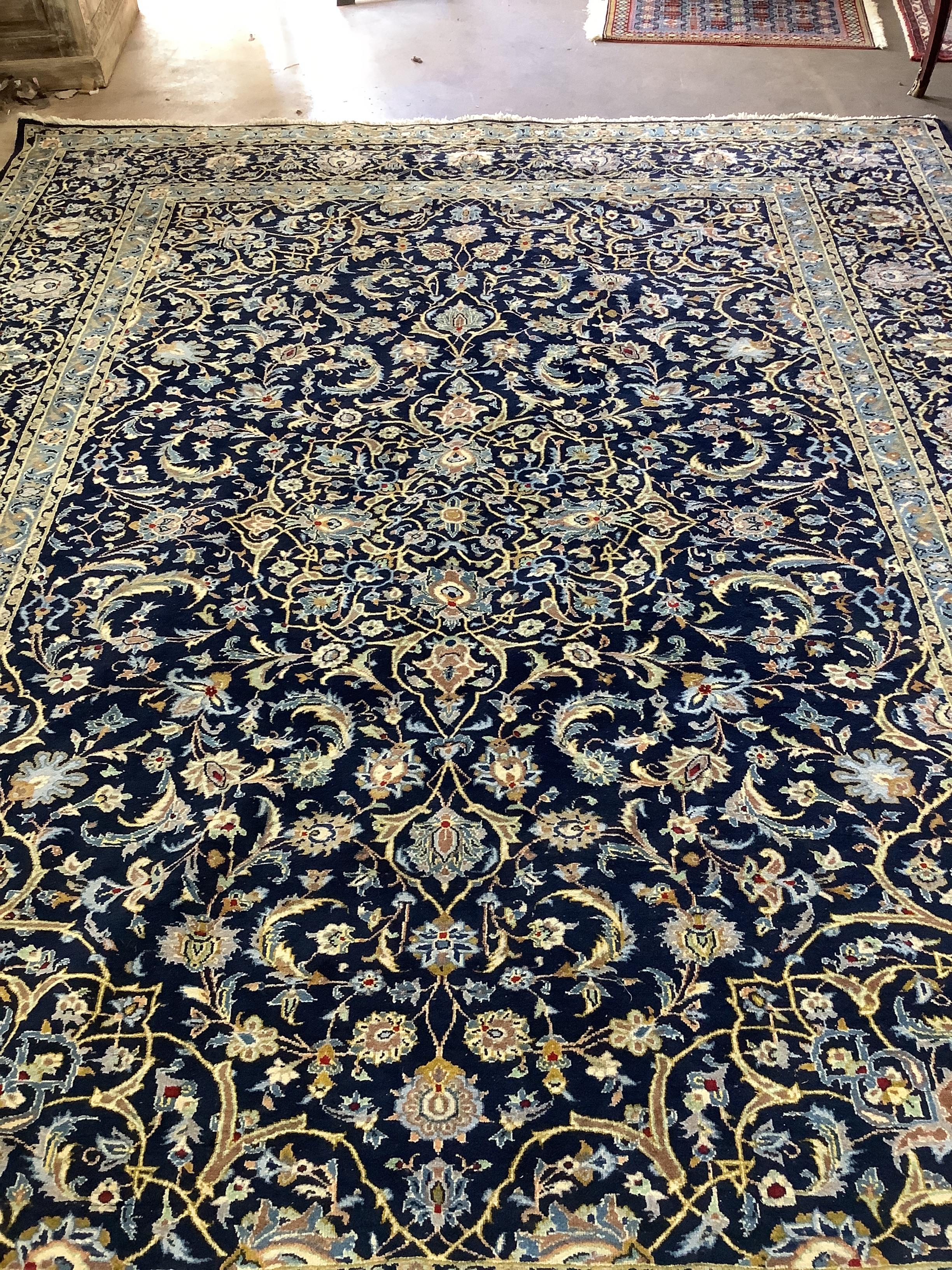 A North West Persian blue ground carpet, 344 x 276cm